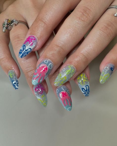 Jellyfish 🪼 Who lives in a pineapple under the sea? #nailtech #nailsnailsnails #sacramentogelx #spongebob #naildesign #nailaddict Spongebob Nails Designs, Sponge Bob Nails, Spongebob Nail Art, Under The Sea Nails, Jellyfish Nails, Spongebob Nails, Fish Nails, Sea Nails, Pineapple Under The Sea