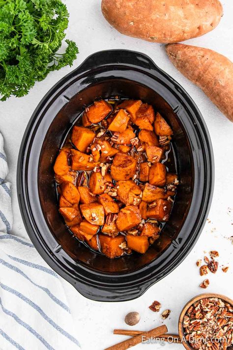 Crockpot Candied Sweet Potatoes - Eating on a Dime Canning Candied Sweet Potatoes, Slow Cooker Sweet Potatoes Pioneer Woman, Crock Pot Sweet Potatoes Thanksgiving, Sweet Potatoes Crockpot Recipes, Sweet Potatoes Crockpot Slow Cooker, Crockpot Sweet Potatoes Thanksgiving, Sweet Potatoes In The Crockpot, Crockpot Mashed Sweet Potatoes, Sweet Potato Crock Pot Recipes