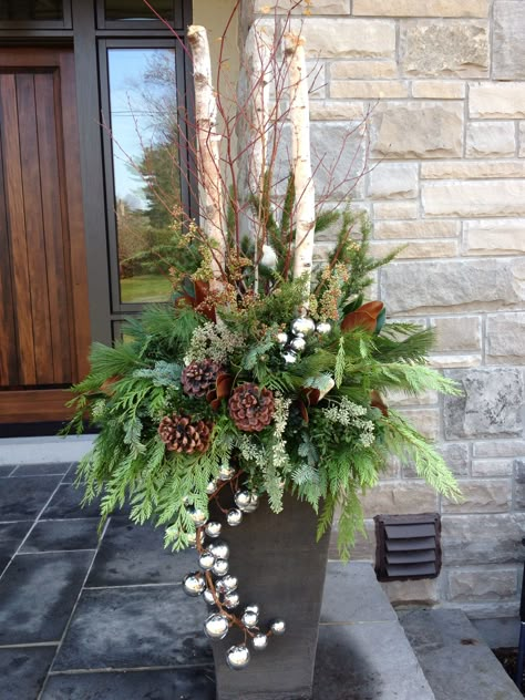 Christmas Outdoor urn by Carla mcgillivray Outdoor Christmas Planters, Outdoor Urns, Christmas Urns, Holiday Planter, Winter Planter, Christmas Pots, Christmas Planters, Christmas Decorations Diy Outdoor, Christmas Arrangements