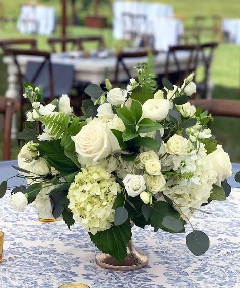 Table Centerpiece in Pedestal container featuring white seasonal flowers by Carithers Flowers Atlanta White Peony Wedding Flowers, Gardenia Floral Arrangement, Classic Elegant Wedding Centerpiece, White Arrangements Flowers, White And Gold Centerpieces, Round Table Arrangements, Green And White Flower Arrangements, Hydrangea Arrangements Wedding, White Garden Flowers