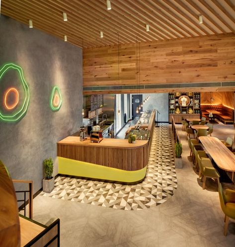 NAO | Avocado Tree Avocado Inspired Design, Interior Design, Radiating Ceiling Design, Colors of an Avocado, Avocado NEON Lights Burrito Restaurant, Avocado Cafe, Caffe Design, Burrito Bar, Pasta Shop, Small Cafe Design, Mexican Restaurants, Healthy Restaurant, Ui Game