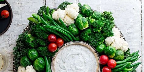 EatingWell Crudité Vegetable Wreath with Ranch Dip Recipe | EatingWell Vegetable Wreath, Cheesy Puff Pastry, Vegetable Appetizer, Christmas Appetizer Recipes, Make Ahead Christmas Appetizers, Ranch Dip Recipe, Homemade Ranch Dip, Chicken Parmesan Meatballs, Easy Hummus Recipe