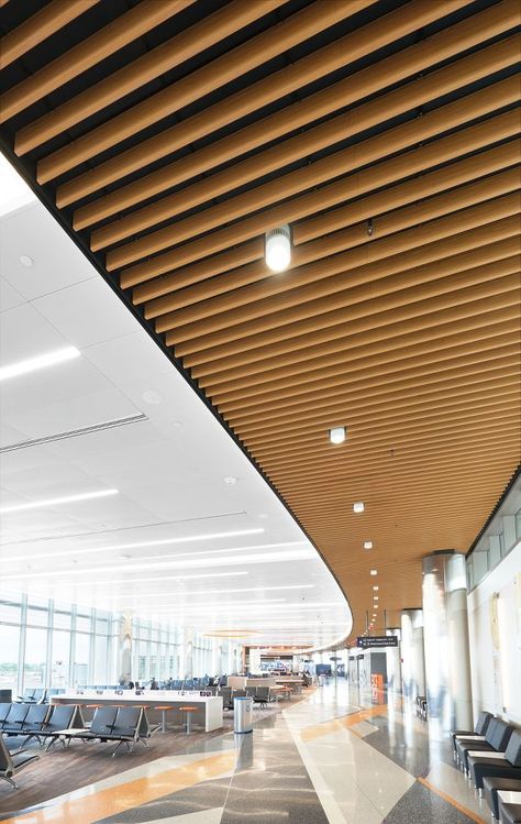 Logan International Airport | Armstrong Ceiling Solutions – Commercial Lacquer Ceiling, Ceiling Skylight, Baffle Ceiling, Architecture Ceiling, Ceiling Solutions, Deck Flooring, Armstrong Ceiling, Airport Design, Hospital Interior