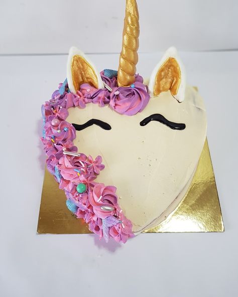 Client asked for a heart shape cake with pink and purple icing and she loves unicorns & mermaids. This is what we created Heart Shaped Unicorn Cake, Unicorn Heart Cake, Unicorn Shaped Cake, Mermaid Inspired Cake, Purple Icing, Heart Shaped Birthday Cake, Butterbean's Cafe, Heart Shape Cake, Twin Birthday Cakes