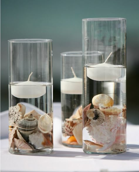 great centerpieces for a beach wedding! #wedding #beach #centerpeice White Floating Candles, Strand Decor, Beach Wedding Centerpieces, White Wedding Theme, Hawaiian Party, Cylinder Vase, Beach Crafts, Seashell Crafts, Floating Candles