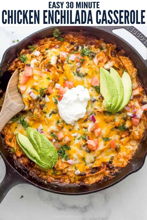 This easy chicken enchilada casserole is for all those Mexican food lovers. It's a fiesta in a skillet and makes the perfect one-pan dinner. Each bite is loaded with chicken, black beans and spicy chilis then topped with cheese and your favorite toppings. You can also make them with beef, pork, or turkey! #enchilada #texmexdinner #chickenenchilada #enchiladacasserole #skilletmeal #onepanmeal One Skillet Street Corn Chicken Enchilada Bake Half Baked Harvest, Enchilada Stove Top, Enchilada Skillet Healthy, One Pan Enchilada Skillet, Mexican Weeknight Dinner, Creamy Chicken Enchilada Skillet, Healthy Enchilada Skillet, Skillet Enchiladas Chicken, Mexican Chicken Dinner Recipes