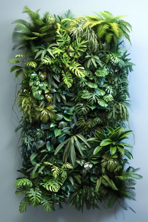 Use floating shelves to display potted plants of different sizes. Arrange them in a staggered pattern for visual interest. Mix in decorative items to create a dynamic look. Living Wall Ideas Indoor, Living Wall Indoor Vertical Gardens, Interior Vertical Garden, Green Wall Garden, Living Wall Indoor, Vertical Green Wall, Green Wall Design, Wall Hanging Decorations, Artificial Green Wall