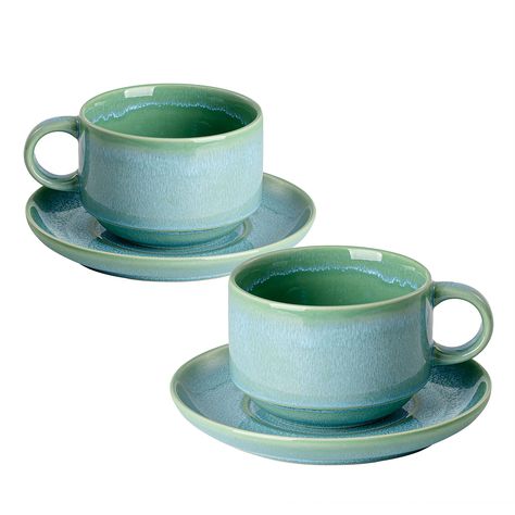 PRICES MAY VARY. Elegant Design: This set of two graceful cappuccino cups and saucers features a unique design to enhance your coffee experience. The sleek, kiln-glazed green cups effortlessly complement your home decor, blending seamlessly into any setting. Thick Walls for Optimal Temperature: This cup and saucer set have insulated thick walls that maintain the perfect coffee temperature. With a 10-ounce capacity, they are ideal for cappuccinos, white coffee, tea, and lattes. Seamless Fit for E Green Coffee Cups, Apartment Goals, Teacup Set, Green Cups, House Items, Coffee Experience, Cappuccino Cups, Cups Set, Coffee Staining