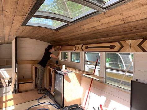 Image may contain: indoor Skoolie Skylight, Van Skylight, Camping Renovations, Mini Skoolie, Skoolie Kitchen, Redon Odilon, Skoolie Ideas, Skoolie Conversion, Airstream Living