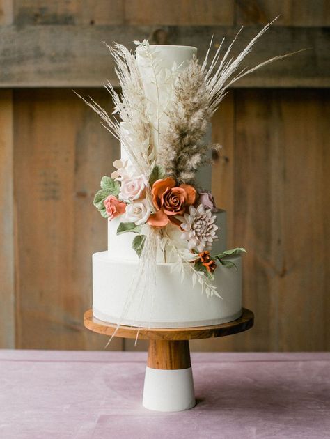 May 22, 2020 - We're obsessed with terra cotta here at GWS and this countryside wedding embodies the color palette beautifully with the coolest blooms and styling! Western Wedding Cakes, Bohemian Wedding Cake, Wedding Cake With Flowers, Boho Wedding Cake, Boho Cake, Cake With Flowers, Cowgirl Wedding, Rustic Boho Wedding, Wedding Cake Rustic