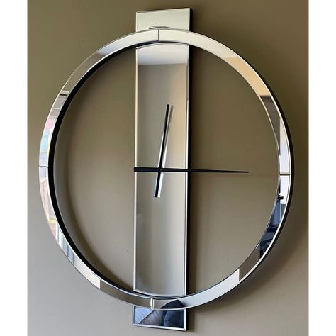 PRICES MAY VARY. Minimalistic Design: With a circle overlapping a rectangular central strip, this mirrored wall clock features a simple and stunning look that effortlessly complements any decoration or color scheme. Compact Dimensions: Measuring 27 inches in height, 23 inches in width, and 1.2 inches in depth, this decorative clock is designed to fit perfectly on your wall. The thick MDF backing ensures a safe and secure hang. Exceptional Craftsmanship: This modern wall clock is meticulously cra Large Clocks Living Room, Large Mirrored Wall Clock, Bedroom Fireplace Decor, Clock Living Room Decor, Silver Wall Clock, Large Wall Clocks, Living Room Wall Clock, Clock Living Room, Silver Wall