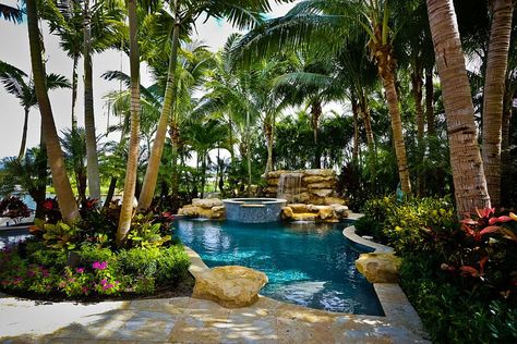 Tropical pool and greenery around it allow you to enjoy a luxurious staycation [Design: Tony Grimaldi Landscape Architecture] Tropical Pool Landscaping, Mini Piscina, Tropical Backyard, Pool Landscape, Pool Landscape Design, Tropical Pool, Natural Swimming Pools, Backyard Pool Landscaping, Backyard Paradise