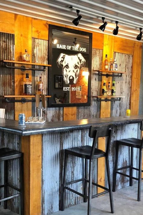 The best ideas for your basement bar including what layout to choose, how to design your home bar, wet bar ideas, the best bar accessories, signs décor and more. Back Bar Wall Ideas, Garage Bar Idea, Bar Ideas For Shop, Front Of Bar Ideas, Rustic Bar Decor Ideas, Bar For Basement Ideas, Country Bar Decor, Garage Bar Decor Ideas, Rustic Garage Bar Ideas