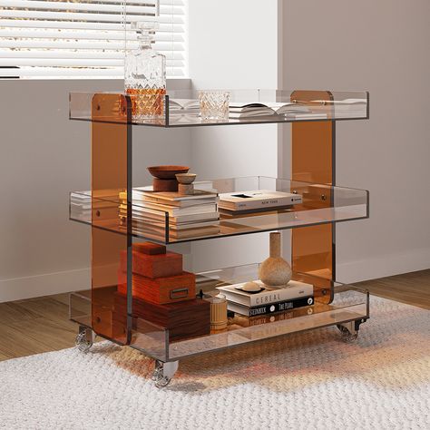 Serve cocktails and wine in style with this functional bar cart. Coming with a 3-tier design, it provides ample storage room for everything you need to serve your guests. Four casters allow you to move this cart easily from one room to the next. Constructed from durable acrylic, this piece allows long-lasting service. Perfect for your living room, game room, or playroom. Acrylic Bar Cart, Coffee Bar Cart, Wooden Shoe Storage, Modern Bar Cart, Serving Bar, White Dining Room, Nesting Coffee Tables, Modular Sectional Sofa, Bench With Shoe Storage