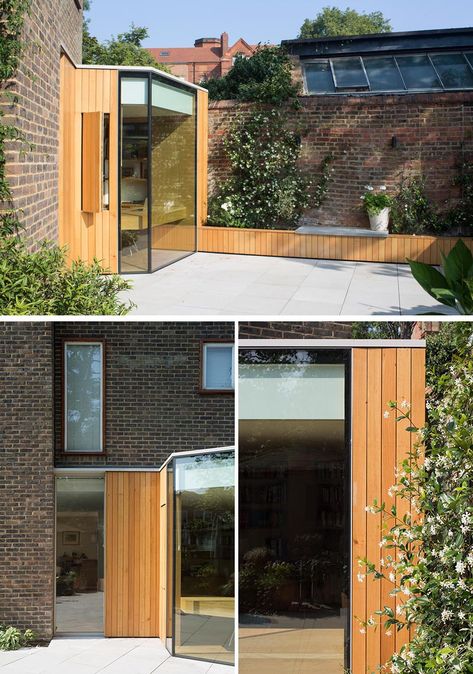 This modern home office design is a spacious and light filled extension that features a folding facade of glass and oak, while inside there's custom designed bookshelves and two desks. #HomeOffice #HomeOfficeDesign #Architecture Home Office Extension, Small Glass Extension, Office Extension, Small Extension, Architecture Lifestyle, House In London, Glass Extension, Unique Office, Extension Designs