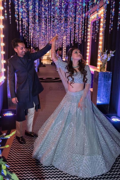 We absolutely love how her Bridal Glow looks more radiant in that Silver Lehenga. If You looking for Trendy Bridal Lehenga, We have complied a great collection of Silver Bridal Lehenga to take inspiration from. Check them all out in the link attached below.    #indianwedding #shaadisaga #intimatewedding #bridallehenga #bridalfashion #offbeatlehenga #uniquelehenga #indianbridaltrends #indianweddingtrends #silverlehenga #greylehenga #embellishedlehenga #sequinlehenga Engagement Lehenga Bridal Collection, Reception Look Bride Indian Lehenga, Pastel Colour Lehenga, Reception Look Bride Indian, Bridal Lehenga Colour, Lehenga Indian Weddings, Wedding Lehangas, Marriage Pic, Silver Lehenga