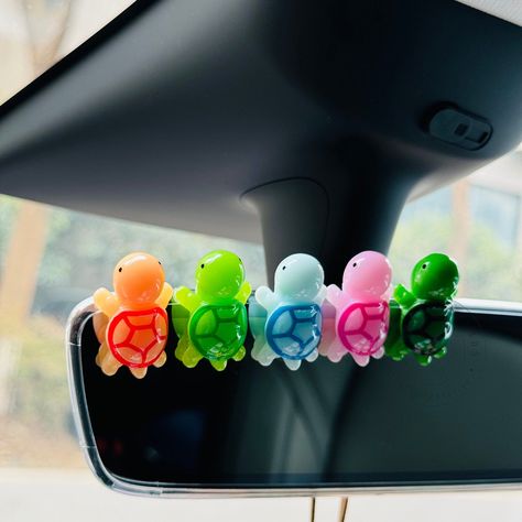 - A set of 5 cute cartoon turtle car ornaments, perfect for decorating your car. Made of high-quality resin, these ornaments are durable and long-lasting. They are also non-toxic and safe for children. #turtle #car #ornament #cartoon Dash Decor Car, Cute Car Ideas Decor, Surfer Car Interior, Fun Car Decor, Funny Car Accessories, Simple Car Interior Decor, Bug Car Aesthetic, Car Inside Decorations, Cute Car Interior Ideas Decor