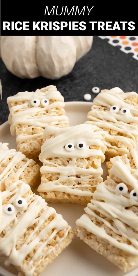 These mummy Krispies treats are an adorable and fun addition to any Halloween party or school event. Chewy and delicious Rice Krispies treats are decorated with creamy white chocolate drizzle and candy eyeballs to turn them into cute and spooky mummy treats that are also super quick and easy. Halloween Rice Crispy Treats, Mummy Treats, Halloween Rice Krispie Treats, Rice Treats, Fun Halloween Treats, Pumpkin Bundt Cake, Krispie Treats Recipe, Rice Krispies Treats, Fun Halloween Food