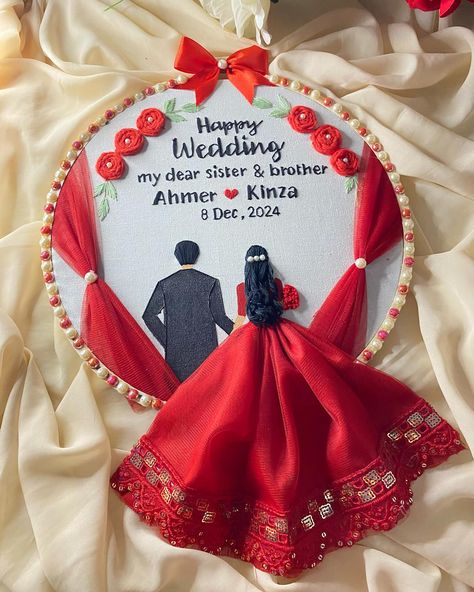 Celebrating your Brothers /sister’s special day with this handmade wedding hoop! 🎉❤️ A personalized touch to mark the beginning of a beautiful journey for the lovely couple. Crafted with love and attention to every detail. Here’s to a lifetime of happiness together! 🧵✨ . . . . . Hoop embroidery / handmade wedding gift / hoop art / DIY products/couple hoop gift / hoop embroidery wedding/ wedding gift / Gift / gifting #AhmerAndKinza #DecemberWedding #instagram #HandmadeLove #WeddingGift #Hand... Wedding Embroidery Hoop Pattern, Handmade Wedding Gift, Wedding Embroidery Hoop, Embroidery Punch Needle, Wedding Hoop, Handmade Wedding Gifts, Embroidery Wedding, Wedding Embroidery, Dear Sister