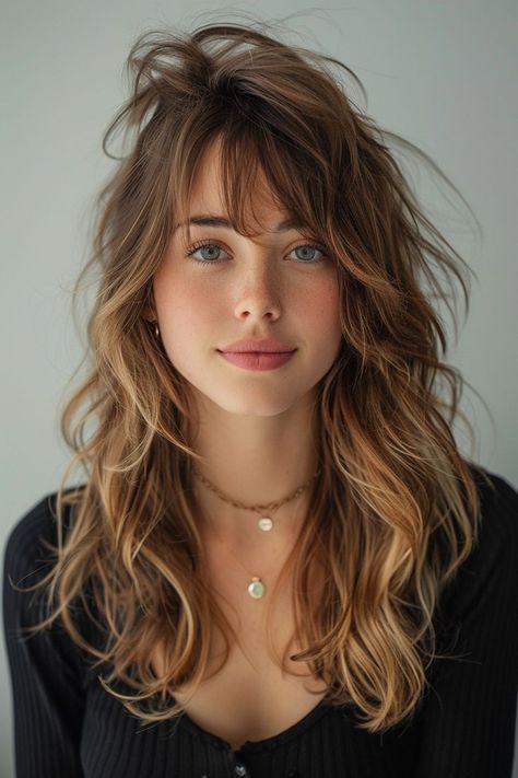 Achieve whimsical elegance with flowy, long curtain bangs that turn straight hair into a fairy tale dream. Ingenue Haircut, Natural Wavy Medium Length Hair, Bangs With Long Curly Hair, Hair Styles Ponytails, Shaggy Hair Ondulado, Brown Hair Fair Skin, Hair Curtain, Bangs Wavy Hair, Mom Hair