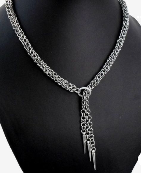 "A lariat style necklace made with a gorgeous Full Persian chainmail pattern, ending with three dangling chains holding metal spikes. From O-ring to spikes, the necklace measures 32\" long, allowing it to be adjustable to your preference. Great for almost any outfit!" Chain Maille Necklace Patterns, Persian Chainmaille Tutorial, Chain Mail Necklace, Belegarth Garb, Chainmaille Patterns, Chainmail Clothing, Chainmaille Jewelry Patterns, Chain Maille Patterns, Chain Maille Necklace