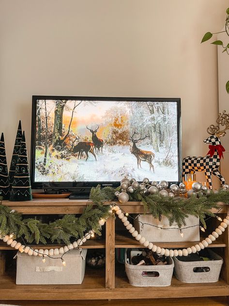 Minimalist Christmas Decor Tv Stand, Decorating Tv Console For Christmas, Tv Stand Xmas Decor, Entertainment Christmas Decor, Tv Console Xmas Decor, Tv Console Christmas Decor Ideas, Tv Stand Holiday Decor, Christmas Decor Ideas Tv Console, Christmas Decor On Tv Console