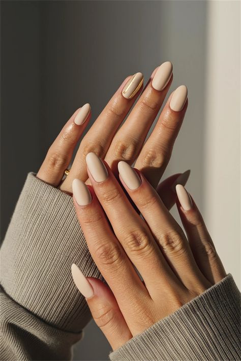 Elevate your look with these chic short simple nail ideas that are perfect for any occasion! This style features a delicate pastel base with a minimalist line design, allowing your natural elegance to shine through. Ideal for those who love sophistication without the fuss, these nails are both trendy and easy to maintain. Embrace simplicity this season! Simple Beige Nail Designs, Low Maintenance Nail Design, Nail October 2024, Short Nail Designs Pastel, Creamy Beige Nails, Simple Gel Nail Designs Natural, Creme Color Nails, Short Simple Nail Ideas, Engagement Shoot Nails