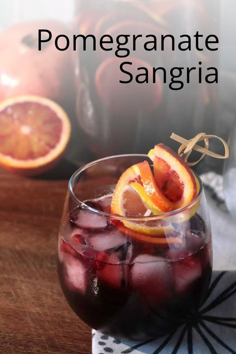 Experience the perfect blend of sweet and tangy with our irresistible Pomegranate Sangria recipe. This refreshing drink is sure to delight your guests and keep them coming back for more, so why not share the love and pin this gem to your drinks board now! #thespiffycookie #pomegranate #sangria #redwine #cocktail Sangria Recipes Sweet, Pomegranate Alcoholic Drinks, Pomegranate Drinks Cocktails, Pomegranate Sangria Recipes, Winter Sangria Recipes, Pomegranate Sangria, Pomegranate Drinks, Pomegranate Vodka, Apple Sangria