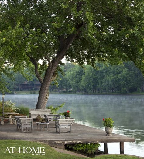 On the dock, weathered teak furniture provides a place to take in the view of the North Little Rock Lake. Lake Dock, Lakeside Living, Piscina Natural, Lake Living, Lake Cottage, Body Of Water, Lake Cabins, River House, Boat Dock