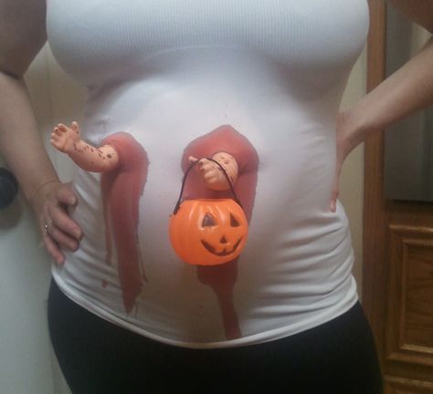 This may be a little on the macabre side but I guarantee it will generate some strong reactions, both positive and negative! My wife wore this while... Halloween Kostüm Joker, Geeky Halloween Costumes, Zombie Costume Kids, Joker Halloween Costume, Zombie Halloween Costumes, Pregnancy Costumes, Pregnant Halloween Costumes, Halloween Costumes To Make, Pumpkin Halloween Costume