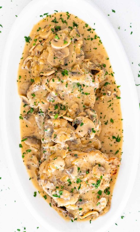 This Instant Pot Pork Chops With Mushroom Gravy recipe is the best way to transform simple everyday ingredients into a special dinner. #instantpot #porkchops #mushroomgravy #recipe Mushroom Soup Gravy, Campbells Mushroom Soup, Pork Chops With Mushroom Gravy, Instant Pot Pork Chops, Mushroom Gravy Recipe, Mushroom Pork Chops, Pork Chops And Gravy, Seared Pork Chops, Jo Cooks