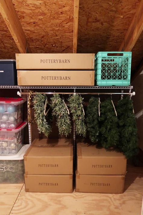 Organized Attic Storage, How To Store Wreaths In Attic, Wreath Storage Ideas, Christmas Decor Storage Ideas, Christmas Ornament Storage Diy, Storage Room Design, Garage Attic Storage, Attic Storage Ideas, Attic Storage Solutions