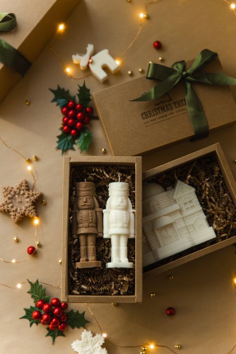 Gift box with 2 Nutcrackers of your choice Variation: 2 Nutcracker ivory color 1 ivory, 1 caramel color 2 caramel color ----------------------------  Gift Box is the perfect gift for yourself, friends or family.  Dimensions: ---------------- H: 5,31 inch  W: 2 inch Dimensions of Box 8 inch x 4,1 inch x 2,3 inch Boxes come wrapped in olive-green satin ribbon Shipping:  ------------- Every candle carefully wrapped and secure placed into shipping box surrounded additional protection layer. Candles are made to order so please allow up to 3-5 business days for dispatch (excluding shipping times).                   About candle: ------------------- Our candles are made with all-natural premium-quality Soy Wax and cotton wicks. They are non-toxic and eco-friendly alternatives to Paraffin wax. Can Christmas Candle Box Ideas, Christmas Gift Box Decoration, Candle Gift Box Packaging, Christmas Candle Gift Box, Christmas Candle Gift Ideas, Christmas Candle Gift Set, Christmas Candles Ideas, Candle Gift Box Ideas, Christmas Candles Decorations