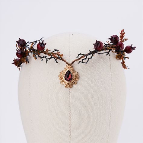 🌞 WHY DO YOU CHOOSE IT
• This beautiful fruit series tiara features a wine red/ black/ purple/ orange teardrop charm surrounded by Pomegranate, Reddish brown branches rattan twisted.
• You can express your love by giving crowns to your lovers, relatives and friends.

🌞 Any Occasions:
• Cosplay, Wedding, Pageant, Proms, Parties, Stage productions, Photoshoot, Anniversary, Halloween, Renaissance Fair, Christmas, Birthday or other special occasions. Persephone Crown, Pomegranate Headpiece, Iron Crown Persephone, Persephone Iron Crown, Dark Floral Headpiece, Red Circlet Crown, Boho Wedding Crown, Fairy Crown, Beautiful Fruits