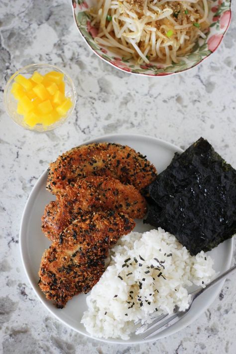 White plate with three big furikake chicken tenders, rice sprinkled with sesame seeds and a few small sheets of seaweed. There's a bowl of marinated bean sprouts, as well as a smaller bowl of bright yellow pickled radish, in the background. Furikake Chicken Recipe, Japanese Seasoning, Roasted Seaweed, Laos Food, Dinner Inspiration, Chicken Tenders, Eat Dessert, Sesame Seeds, Recipe Using