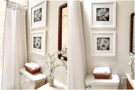 Is it OK to hang pictures in a bathroom? | UTR Decorating Hang Pictures, How To Fold Towels, Over Toilet, Bar Displays, Towel Racks, Toilet Tank, Towel Rack Bathroom, Bathroom Pictures, In Bathroom