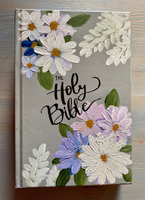 This is a personalized Bible made just for that special someone or yourself. No two Bibles will look just alike, I will do the same design but being hand painted they will present their own unique look. Price of Bible includes Bible (message what specific translation you would prefer) artwork, personalization (message me for Bible verse, name of person and what you want on the front of the Bible), and shipping. Bible Cover Art Aesthetic, Painted Bible Cover Ideas Simple, Bible Cover Painting Ideas, Decorating Bible Cover, Painted Bible Ideas, Hand Painted Bible Cover Ideas, Painted Book Of Mormon Cover For Boys, Cute Bible Covers, Paint Bible Cover