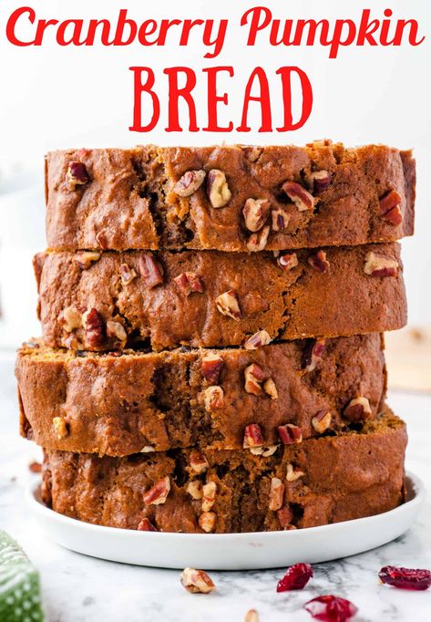 This Cranberry Pumpkin Bread is simple to make and has all the flavors of fall! It is a combination of pumpkin, dried cranberries and pecans with nutmeg, ginger and cinnamon. Enjoy the aroma of pumpkin baking on a chilly day with this easy pumpkin bread recipe! Craisin Pumpkin Bread, Pumpkin And Cranberry Recipes, Pumpkin Cranberry Nut Bread, Cranberry Pumpkin Bread Recipe, Cranberry Pumpkin Bread, Dried Cranberries Recipes, Pumpkin Pecan Bread, Cranberry Nut Bread, Pumpkin Cranberry Bread