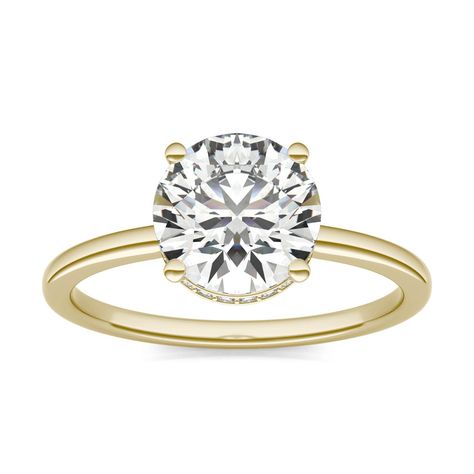 Looking for an engagement ring that is both timeless and fashionable? This 18K yellow gold halo engagement ring, featuring CaydiaTM lab grown diamonds, has it all and more! This hidden halo solitaire ring features a round, 4-prong single center stone that sits atop a lovely hidden halo with round accent stones. Additional metal colors are available. | Hidden Halo Solitaire Engagement Ring in 18K Yellow Gold, Size: 7, 2 1/10 CTW Round Caydia Lab Grown Diamond - VS1 | Charles & Colvard Yellow Gold Halo Engagement Ring, Halo Solitaire Engagement Ring, Rose Gold Halo Engagement Ring, Yellow Gold Solitaire, Dream Engagement Rings, Hidden Halo, Pretty Rings, Gold Diamond Rings, Halo Engagement Ring