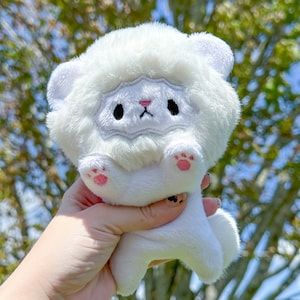 Peanut the Lion! He’s an all white lion with pink toe beans 🤍💗 Peanut is a perfect gift for any animal lover or plush collector.  This little lion is a handful of cuteness! Handmade with soft minky and high quality short pile faux fur for his mane! Lion Plush Pattern, Lion Plushie, Cute Cat Plush, Lion Stuffed Animal, Pink Lion, Lion Plush, Toe Beans, Pink Toes, Handmade Plushies