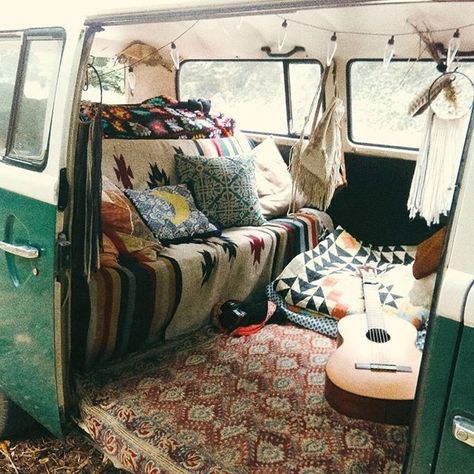 Furnished VW bus volkeswagen bus with geometric Aztec blankets acoustic guitar and bohemian Bohemia fashion style interior feuding Hippie Van Interior, Combi Hippie, Volkswagen Bus Interior, Kombi Hippie, Old Van, Vans Vintage, Kombi Motorhome, Pillows And Blankets, Camper Travel