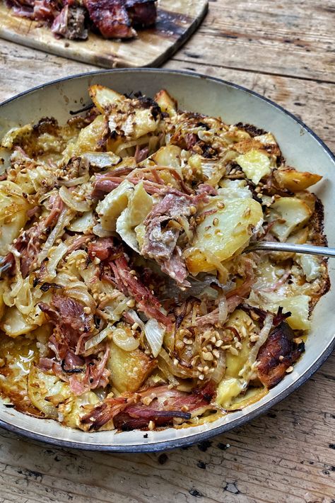 This is potentially our favourite Christmas recipe. Cheesy and laced with delicious sweet flavours from our Black Treacle Gammon, this cheesy potato & pulled gammon tartiflette is the most indulgent dish around. It’s basically a cross between Alpine fondue style cheesy potatoes and Dauphinoise Potatoes. Serve it up as part of your Christmas dinner or for a Christmas gammon recipe. #gammon #gammonrecipe #Christmasrecipe #Christmasfoodidea #Christmasrecipes #Christmasgammon #tartiflette #potatoes Christmas Gammon Recipes, Slow Cooked Gammon, Ham Egg And Chips, Slow Cooker Gammon, Roast Gammon, Gammon Recipes, Black Treacle, Tartiflette Recipe, Ham Dinner