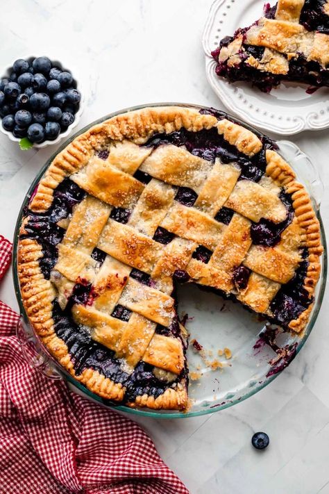 This better-than-ever homemade blueberry pie is bursting with a sweet juicy blueberry filling that pairs perfectly with a golden-brown buttery, flaky pie crust. The filling sets perfectly and is neither soupy nor runny. Your time and effort will be rewarded with every satisfying from-scratch slice! Recipe on sallysbakingaddiction.com Best Blueberry Pie Recipe, Easy Blueberry Pie, Blueberry Pie Recipe, Fresh Blueberry Pie, Homemade Blueberry Pie, Easy Pie Crust, Easy Blueberry, Easy Pie, Fruit Pie