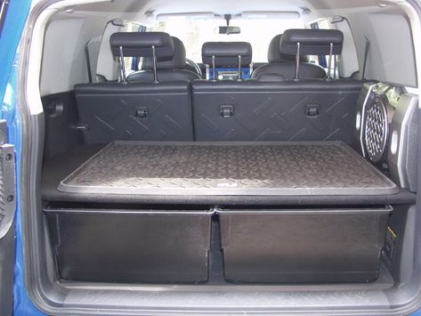 Fj Cruiser Camper, Suv Tool Storage Ideas, Suv Hacks, Jeep Trunk, Fj Cruiser Interior, Fj Cruiser Parts, Suv Trunk Organization, Fj Cruiser Accessories, Fj Cruiser Mods