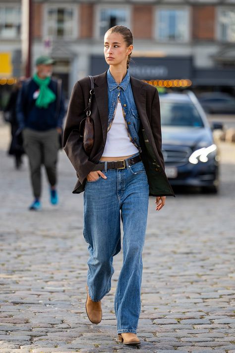 This Is the Cool Way to Wear Denim-Shirt Outfits in 2024 | Who What Wear Classic Fashion Pieces, Denim Shirt Outfit, Classic Wardrobe Pieces, Blue Denim Shirt, Western Denim Shirt, Leather Blazer Jacket, Ag Jeans, Classic Wardrobe, Loose Jeans