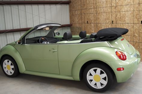 Daisy Car Rims, Green Convertible Beetle, Volkswagen Beetle Convertible Green, Volkswagen Beetle Flower Rims, Beetle Car With Daisy Rims, Daisy Rims Car, Flower Rims Beetle, 2018 Beetle Convertible, Green Beetle Car Aesthetic