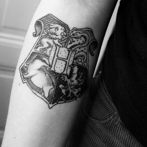 http://tattoomagz.com/accios-tattoos/awesome-looking-lions-accio-tattoo/ Reading Obsession, Crest Tattoo, Hp Tattoo, Literary Tattoos, Theme Tattoo, Harry Potter Tattoo, Harry Potter Tattoos, Harry Potter Obsession, Harry Potter Hogwarts