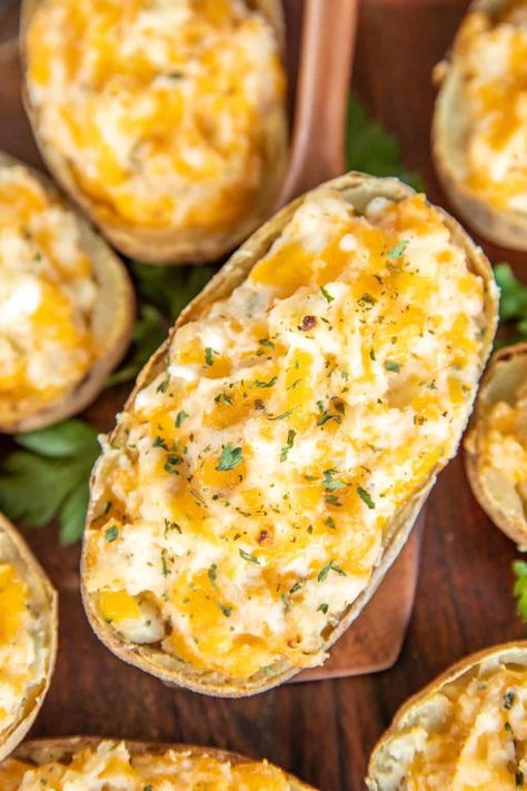 Million Dollar Twice Baked Potatoes – the BEST potatoes EVER!! Loaded with three types of cheese! Can make in advance and freeze for later. Baked potatoes, sour cream, cream cheese, cottage cheese, cheddar cheese, butter, garlic, salt, and pepper. Easy enough for a weeknight and fancy enough for a dinner party! Make these ASAP! #potatoes #bakedpotatoes #cheese Baked Potatoes In The Oven, Potato Side Dishes Easy, Potatoes In The Oven, Cream Cheese Potatoes, Layered Salad Recipes, Cheese Cheddar, Chicken Baked, Cheese Butter, Layered Salad