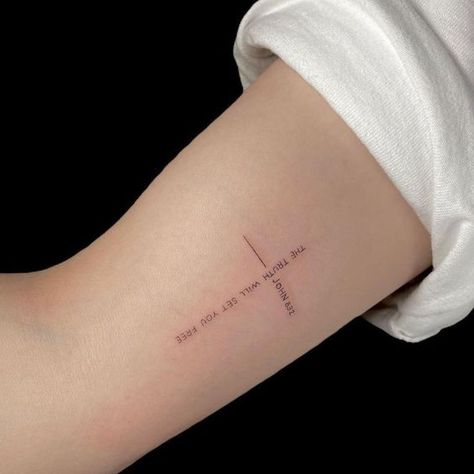 17 Stunning Biblical Tattoo Ideas for Women: Embrace Faith with Graceful Designs Fine Line Tattoo Ideas Biblical, Christian Wrap Around Tattoo, Minimalist Tattoo About God, Remain In Me Tattoo, Biblical Quote Tattoos For Women, Meaningful Biblical Tattoos, Cross With Writing Tattoo, God Timing Tattoo, Colossians 3 23 Tattoo