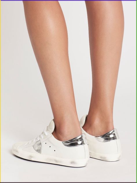 Make a statement in style with the Philippe Model Paris Sneaker in Basic Blanc/Silver. These luxurious sneakers are made with Italian leather and feature purposeful scuff marks around the sole, giving them an ultra-cool grunge-inspired finish that is sure to turn heads. The perfect addition to any wardrobe, these white sneakers are both comfortable and stylish, combining class and charm with effortless ease. Whether you're running errands or hitting the town, the Philippe Model Paris Sneaker is Italian Fashion Street, Sneaker Outfits Women, Philippe Model, Italian Craftsmanship, Trending Sneakers, Sneaker Brands, White Sneakers, Black Design, White Sneaker